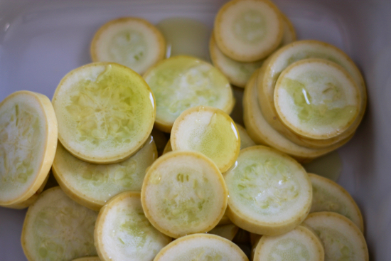 Squash and Olive Oil for Baked Summer Squash. It's is simple, delicious and economical. The perfect side dish for summer. You'll be surprised how quickly it disappears. | sarahnspice.com