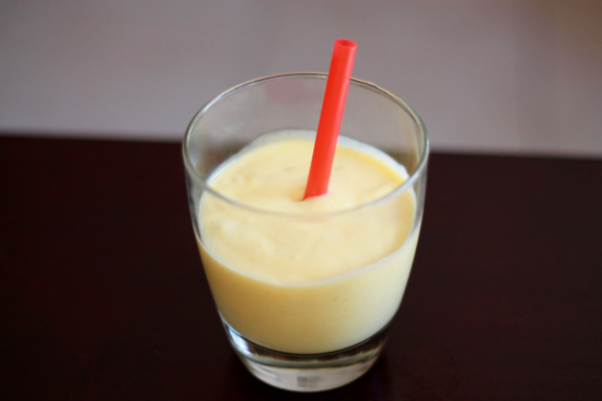 A super easy recipe for aMango Lassi that's sweet, creamy, cool and refreshing! This drink is absolutely perfect on a hot summer day! | sarahnspice.com