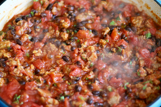 This one-pot Breakfast Casserole has an amazing Tex-Mex flavor with cumin and black beans, chipotle peppers and fried eggs right on top! | sarahnspice.com