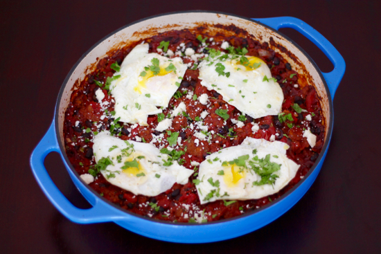 This one-pot Breakfast Casserole has an amazing Tex-Mex flavor with cumin and black beans, chipotle peppers and fried eggs right on top! | sarahnspice.com