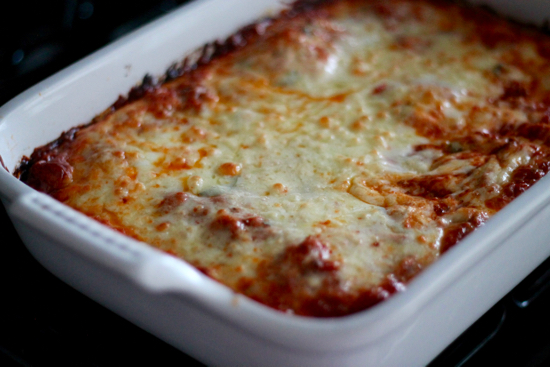 There's nothing like hearty and flavorful pan of lasagna. This Meat Lasagna is cheesy, gooey and made with fresh homemade pasta! | sarahnspice.com