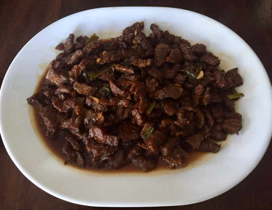 Mongolian Beef has crispy tender beef slices covered in a sweet & salty concoction. It’s a decadent & delicious recipe you can make it right at home! | sarahnspice.com